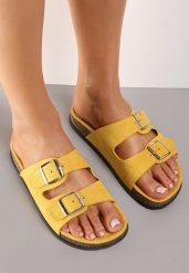 Żółte Klapki Kleogoria. Żółte klapki damskie Born2be, bez wzorów, eleganckie, bez obcasa, na płaskiej podeszwie. Za 59.99 zł.