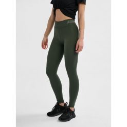Damskie legginsy Hummel. Brązowe legginsy damskie Hummel, bez wzorów, z dżerseju, na fitness i siłownię. Za 174.50 zł.