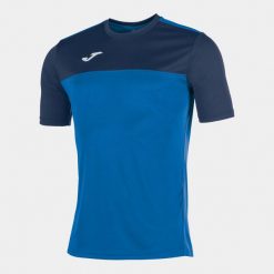 Koszulka do piłki nożnej dla chłopców Joma Winner. Niebieskie t-shirty dla chłopców Joma, bez wzorów, z materiału, bez ramiączek. Za 60.00 zł.