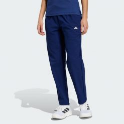 Spodnie Workout Essentials Woven. Czarne spodnie dresowe damskie Adidas, l, bez wzorów, z dresówki. Za 219.00 zł.
