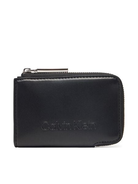 Calvin Klein Portfel Embossed Logo Zip Cardholder K60K613157 Czarny. Czarne portfele damskie Calvin Klein, bez wzorów, ze skóry. Za 139.99 zł.