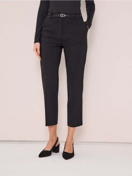 Spodnie chino z paskiem - czarny. Czarne spodnie materiałowe damskie Sinsay, l, bez wzorów. Za 59.99 zł.