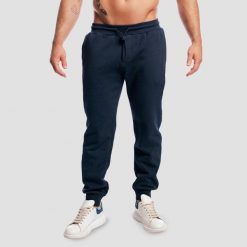 Spodnie dresowe męskie fitness oversize Base Nightfall. Niebieskie spodnie sportowe męskie GYMBEAM, l, bez wzorów, z bawełny, na fitness i siłownię. Za 140.90 zł.