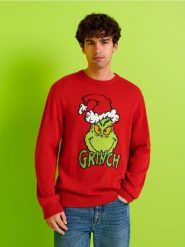 Sweter Grinch - koralowy. Pomarańczowe swetry przez głowę męskie Sinsay, l, bez wzorów, bez kołnierzyka. Za 69.99 zł.