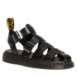 Sandały Dr. Martens. Czarne klapki damskie Dr. Martens, bez wzorów, bez obcasa, na płaskiej podeszwie, bez zapięcia. Za 499.99 zł.