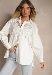 Biała Koszula Oversize z Bawełny z Ażurowymi Zdobieniami z Motywem Kwiatowym Voesia. Białe bluzki damskie Renee, m, z aplikacjami, z bawełny, eleganckie, bez kołnierzyka, bez ramiączek. Za 139.99 zł.