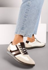 Brązowe Stylowe Sneakersy na Płaskiej Podeszwie z Geometrycznymi Przeszyciami Rialine. Brązowe obuwie sportowe damskie Born2be, bez wzorów, z jeansu. Za 69.99 zł.