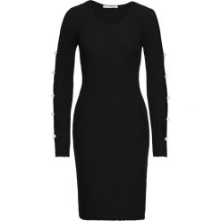 Sukienka z wycięciami na rękawach bonprix czarny. Czarne sukienki damskie bonprix, bez wzorów, z dzianiny, eleganckie, bez kołnierzyka, bez ramiączek. Za 149.99 zł.