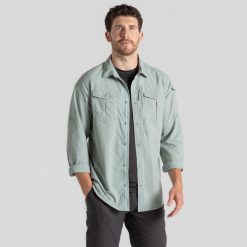 Koszula podróżnicza męska Craghoppers NosiLife Adventure LS Shirt III. Zielone koszule męskie Craghoppers, m, bez wzorów, casualowe, bez kołnierzyka, bez ramiączek. Za 377.99 zł.