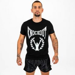 Krótka koszula V1. Czarne koszule męskie KNOCKOUT, l, bez wzorów, z bawełny, eleganckie, bez kołnierzyka, bez ramiączek. Za 86.27 zł.