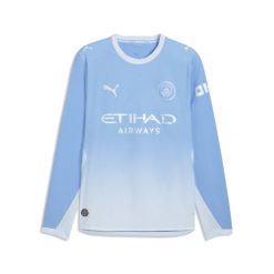 Męska autentyczna koszulka domowa z długim rękawem Manchester City 26/27 PUMA. Niebieskie bluzki z długim rękawem męskie Puma, m, bez wzorów, z materiału, klasyczne, bez kołnierzyka. Za 689.00 zł.