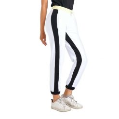 Neonowe spodnie dresowe damskie. Białe obuwie sportowe damskie LEONE 1947 APPAREL, l, bez wzorów, z dresówki. Za 105.21 zł.
