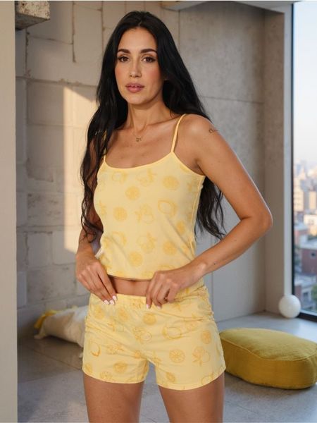 Piżama dwuczęściowa na ramiączkach z motywem cytryny - żółty. Żółte piżamy damskie Sinsay, l, bez wzorów, bez ramiączek. Za 25.99 zł.