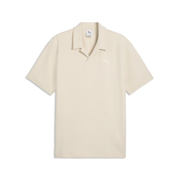 Męska koszulka polo Essentials Elevated PUMA. Niebieskie koszulki polo męskie Puma, na wiosnę, l, bez wzorów, z bawełny, klasyczne, bez ramiączek. Za 169.00 zł.