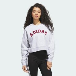 BLUZA Z TKANINY SZENILOWEJ Z LOGO I GRAFIKĄ. Czerwone bluzy damskie Adidas, na zimę, xs, z aplikacjami, z bawełny, bez kaptura. Za 259.00 zł.