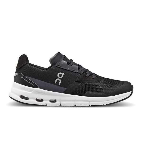 Buty do biegania damskie On Cloudrift. Czarne obuwie sportowe damskie On, bez wzorów, z materiału, do biegania. Za 832.00 zł.