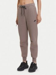 Nike Spodnie dresowe Tech Fleece HV6779 Brązowy Regular Fit. Brązowe spodnie dresowe damskie Nike, s, bez wzorów, z bawełny. Za 429.99 zł.