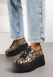 Panterkowe Sneakersy Vices na Grubej Podeszwie z Metaliczną Ozdobą Tatorelis. Obuwie sportowe damskie Born2be, z aplikacjami, z jeansu. Za 119.99 zł.