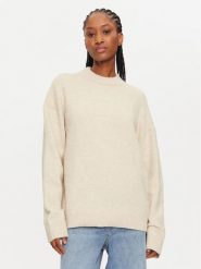 Calvin Klein Sweter J20J224636 Brązowy Regular Fit. Brązowe swetry damskie Calvin Klein, s, bez wzorów, z syntetyku, bez kołnierzyka, bez ramiączek, bez kaptura. Za 479.99 zł.
