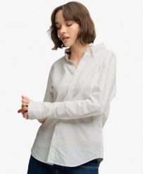 Superdry Damska Koszula Slim Oxford z Długim Rękawem – Bawełna Bio – Optic. Białe koszule damskie Superdry., bez wzorów, z bawełny, eleganckie, bez kołnierzyka, bez ramiączek. Za 287.30 zł.