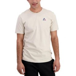 T-shirt Le Coq Sportif Model Ess Te Ss N Kolor Beżowy. Brązowe t-shirty męskie le coq sportif, m, z aplikacjami, z bawełny, klasyczne, bez kołnierzyka. Za 184.00 zł.