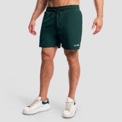 Szorty męskie fitness regular z kieszeniami Base Forest. Zielone krótkie spodenki sportowe męskie GYMBEAM, m, bez wzorów, z elastanu, do biegania. Za 97.90 zł.
