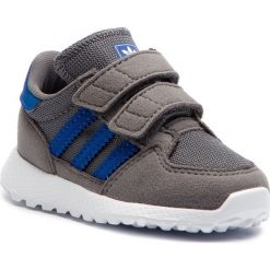 Buty adidas - Forest Grove Cf I AQ1803 Grefou/Croyal/Ftwwht/Griqua/Blroco/Ftwbla. Półbuty chłopięce marki Adidas. W wyprzedaży za 149.00 zł.