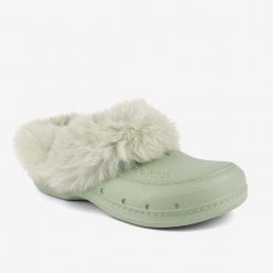Damskie ocieplane klapki Coqui Husky. Brązowe klapki damskie Coqui, bez wzorów, z materiału, bez obcasa. Za 134.99 zł.