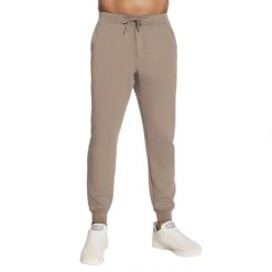 Spodnie sportowe męskie Skechcloud Elevate 2.0 Jogger Pant. Brązowe spodnie sportowe męskie Skechers, m, bez wzorów, z materiału, na fitness i siłownię. Za 269.99 zł.