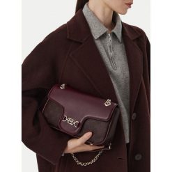 Torebka Nine West. Czerwone torebki do ręki damskie Nine West, bez wzorów, klasyczne, bez dodatków. Za 229.99 zł.