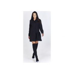 Nietuzinkowa sukienka z dwiema różnymi połowami - jedna klasyczna, druga z falbaniastym dołem. Sukienki damskie Bird. Za 379.00 zł.