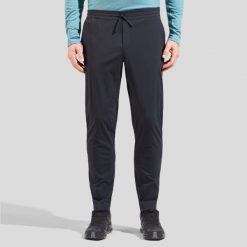 Spodnie męskie ODLO Essential Pants Regular Length. Czarne spodnie sportowe męskie Odlo, na lato, l, bez wzorów, trekkingowe. Za 384.25 zł.
