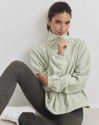Damska kurtka polarowa na zamek Fleece Zip pistacjowa. Zielone kurtki sportowe damskie Aim'n, l, bez wzorów, z materiału, bez kaptura, trekkingowe. Za 430.00 zł.