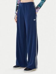 Adidas Spodnie dresowe adicolor Firebird JV7524 Granatowy Regular Fit. Niebieskie spodnie dresowe damskie Adidas, xl, bez wzorów, z dresówki. Za 279.99 zł.