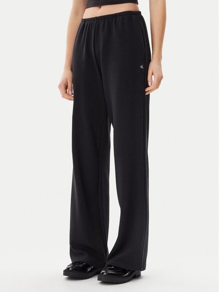 Calvin Klein Jeans Spodnie dresowe J20J225537 Czarny Straight Fit. Czarne jeansy damskie Calvin Klein Jeans. Za 229.99 zł.