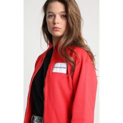 Calvin Klein Jeans ZIP UP TRACK Bluza rozpinana tomato. Bluzy damskie marki Calvin Klein Jeans. Za 549.00 zł.