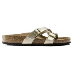 BIRKENSTOCK Yao Balance BF Gold Klapki damskie. Żółte klapki damskie Birkenstock, bez wzorów, ze skóry, eleganckie, bez obcasa. Za 299.99 zł.