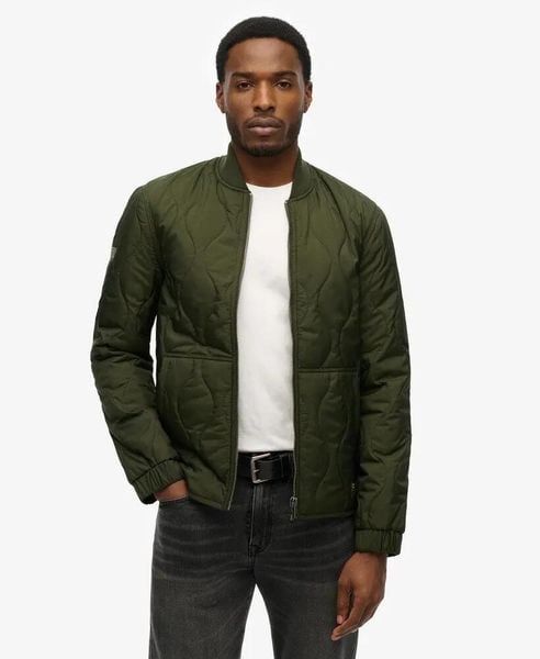 Superdry Kurtka Surplus Quilted Liner Olive Green. Zielone kurtki męskie Superdry., m, bez wzorów, z elastanu, bez kaptura. Za 395.45 zł.
