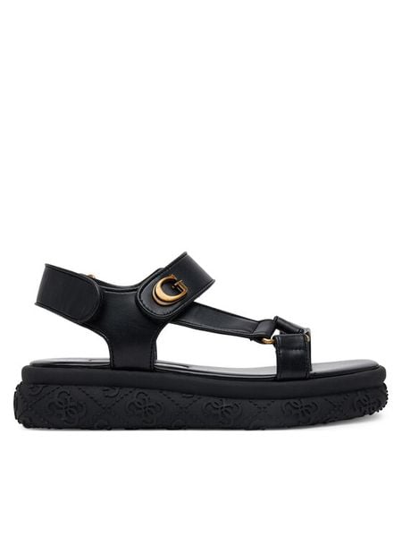 Guess Sandały FLJLAN ELE03 Czarny. Czarne sandały damskie Guess, z aplikacjami, ze skóry, bez obcasa, na płaskiej podeszwie, bez zapięcia. Za 379.99 zł.