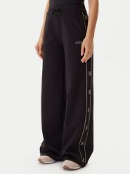 Guess Spodnie dresowe V5BB12 KCX22 Czarny Wide Leg. Czarne spodnie dresowe damskie Guess, xl, z aplikacjami, z dresówki. Za 339.99 zł.