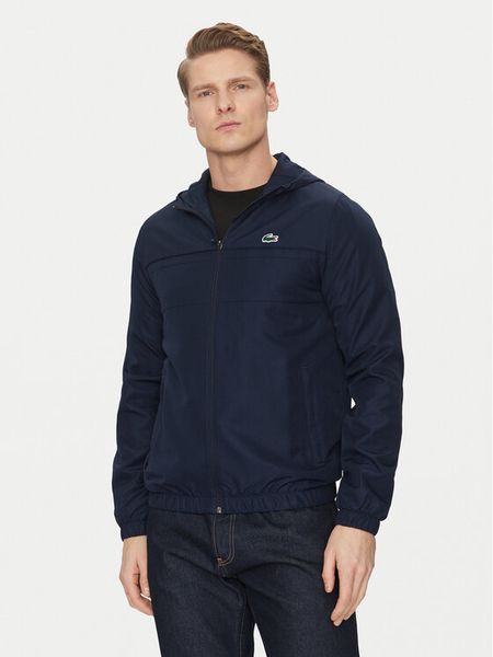 Lacoste Kurtka przejściowa BH3466 Granatowy Regular Fit. Niebieskie kurtki męskie Lacoste, m, bez wzorów, z syntetyku, bez kaptura. Za 466.99 zł.