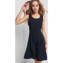 Sukienka ze zwierzęcym wzorem. Sukienki damskie marki Orsay. Za 139.99 zł.