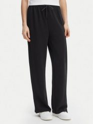 ONLY Spodnie materiałowe Maya 15369156 Czarny Loose Fit. Czarne spodnie materiałowe damskie Only, m, bez wzorów, z materiału. Za 169.99 zł.