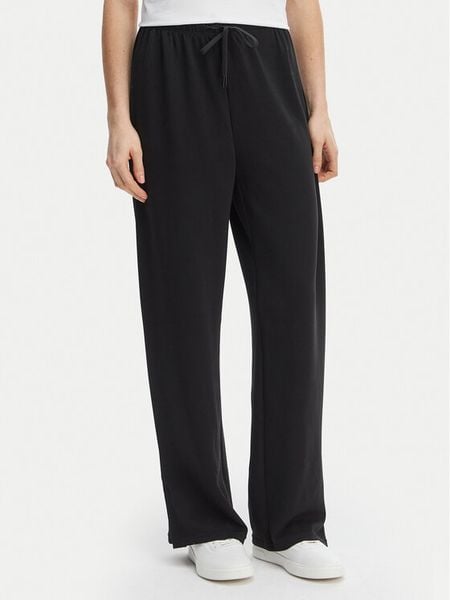 ONLY Spodnie materiałowe Maya 15369156 Czarny Loose Fit. Czarne spodnie materiałowe damskie Only, xs, bez wzorów, z materiału. Za 169.99 zł.