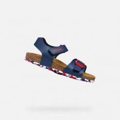 Sandały GEOX J GHITA BOY Niebieski. Białe sandały męskie Geox, z syntetyku, bez zapięcia. Za 179.99 zł.