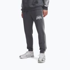 Spodnie treningowe męskie Under Armour Rival Fleece. Szare buty sportowe męskie Under Armour, m, bez wzorów, na fitness i siłownię. Za 209.99 zł.