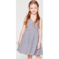 Sukienka w kratę gingham dla dziewczynki Little Princess - Biały. Sukienki dla dziewczynek marki Mohito. W wyprzedaży za 49.99 zł.