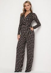 Brązowy Wzorzysty Kombinezon Kopertowy z Wiskozą z Szerokimi Nogawkami i Paskiem Aotavia. Brązowe sukienki damskie Born2be, na co dzień, l, bez wzorów, z materiału, bez kołnierzyka, bez ramiączek, kopertowe. Za 79.99 zł.