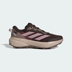 Buty do biegów przełajowych Terrex Tracefinder Plus GORE-TEX. Brązowe obuwie sportowe damskie Adidas, bez wzorów, z gore-texu, do biegania. Za 529.00 zł.
