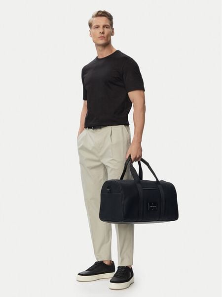 Tommy Hilfiger Torba weekendowa Th Foundation Duffle AM0AM14441 Czarny. Czarne torebki do ręki damskie Tommy Hilfiger, bez wzorów, bez dodatków. Za 649.99 zł.